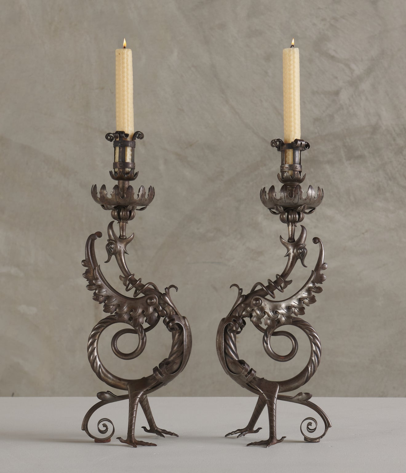 PAIR OF GRIFFIN CANDLESTICKS, C1900