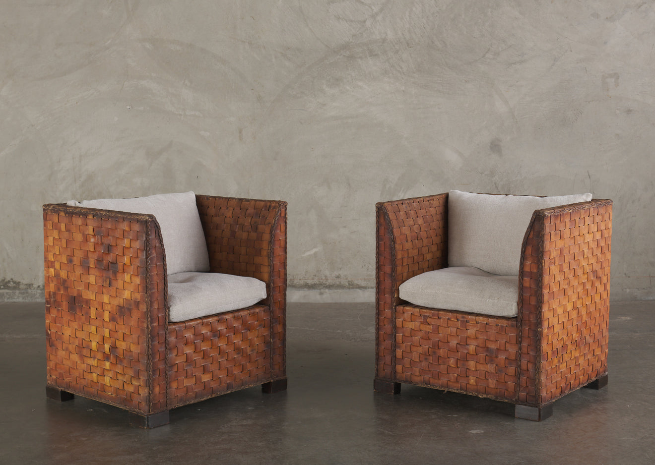 PAIR OF LEATHER STRAPPED CLUB CHAIRS, MID 20TH C