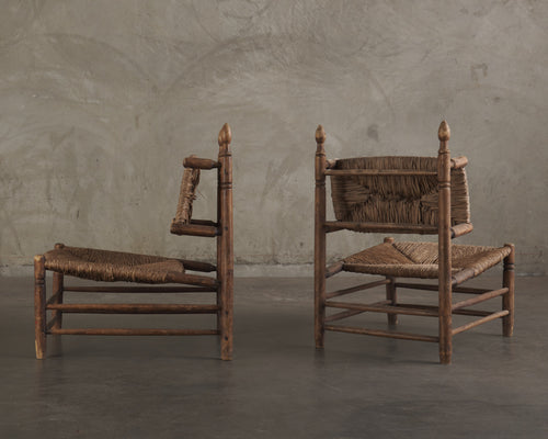 PAIR OF LOUNGE CHAIRS IN THE MANNER OF CHARLOTTE PERRIAND