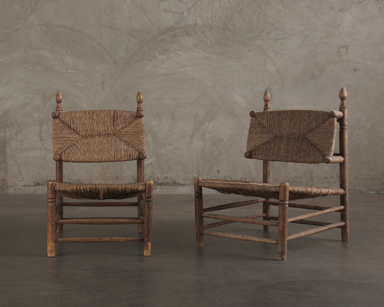 PAIR OF LOUNGE CHAIRS IN THE MANNER OF CHARLOTTE PERRIAND