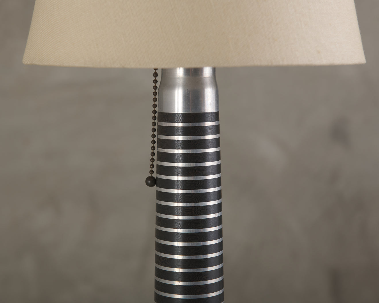 PAIR OF MACHINE AGE ALUMINUM LAMPS