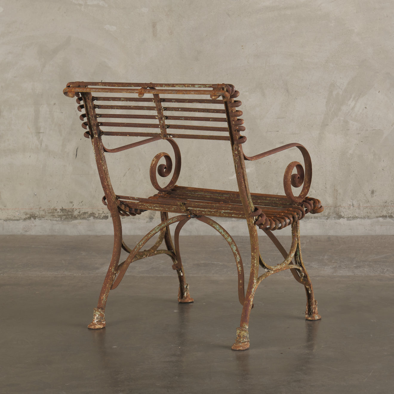 PAIR OF SAINT SAUVEUR 'ARRAS' IRON ARM CHAIRS, FRANCE C1900