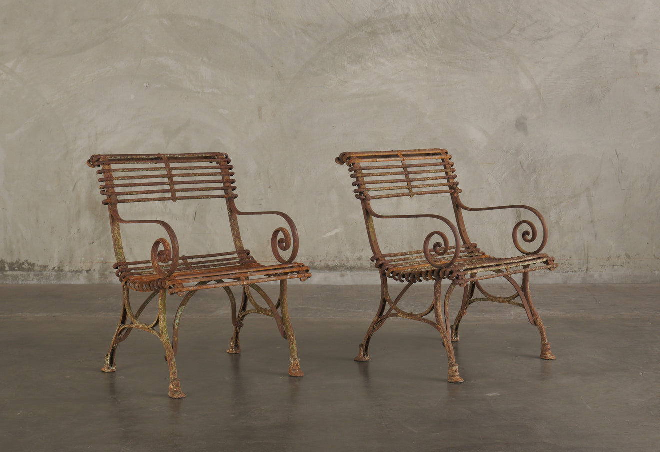 PAIR OF SAINT SAUVEUR 'ARRAS' IRON ARM CHAIRS, FRANCE C1900