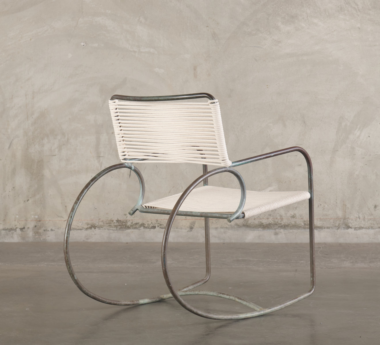 PAIR OF WALTER LAMB FOR BROWN JORDAN ROCKING ARM CHAIRS, 1950's