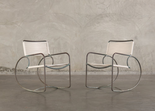 PAIR OF WALTER LAMB FOR BROWN JORDAN ROCKING ARM CHAIRS, 1950's