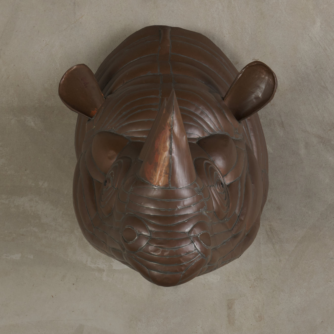 SERGIO BUSTAMANTE ( b.1942) RHINOCEROUS WALL TROPHY, 1970s