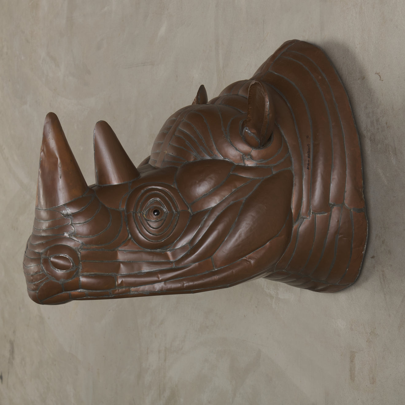 SERGIO BUSTAMANTE ( b.1942) RHINOCEROUS WALL TROPHY, 1970s