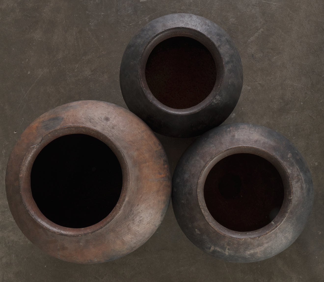 SET OF THREE OAXACAN STACKING CLAY VESSELS