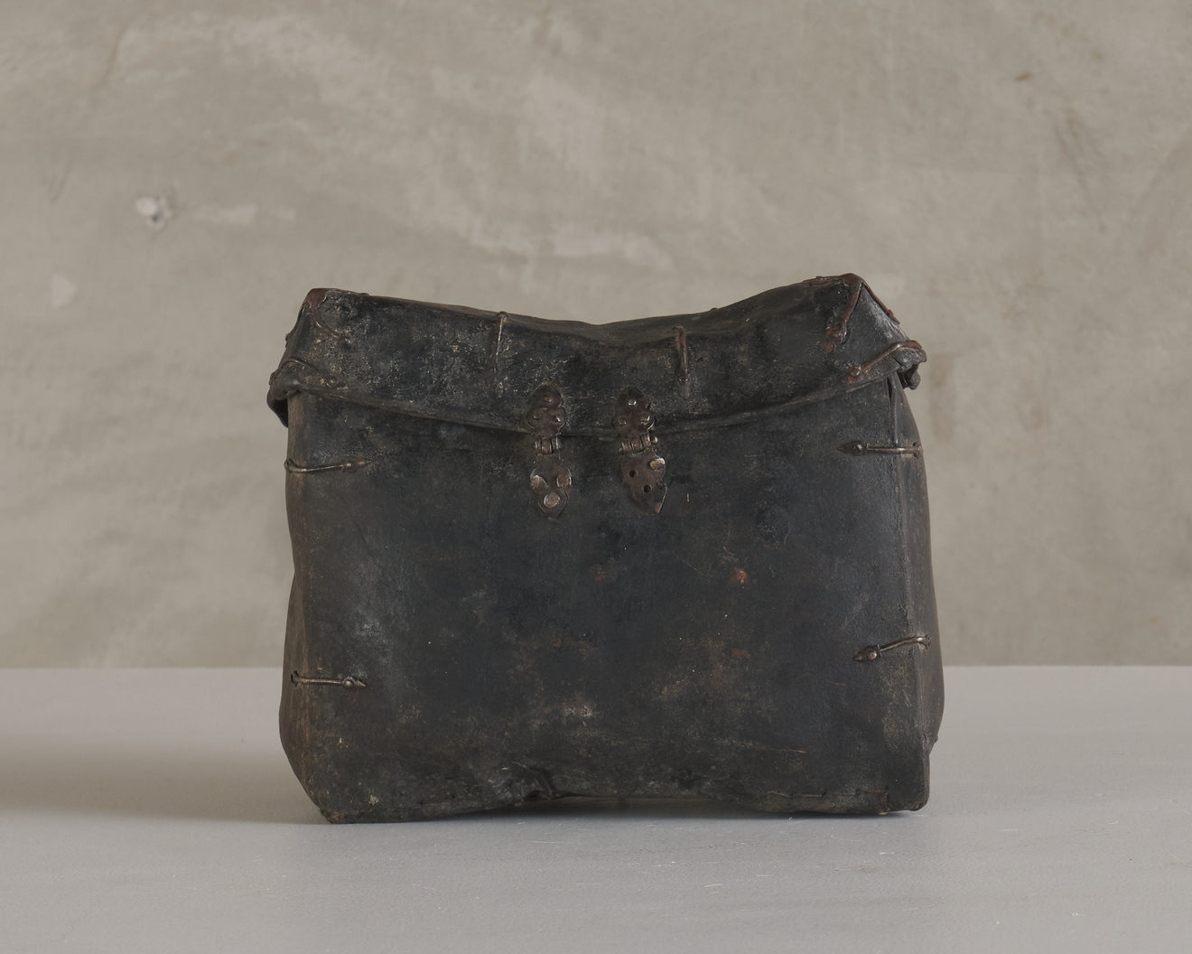 TIBETAN YAK LEATHER AND IRON SMALL BOX, 18th/19th CENTURY