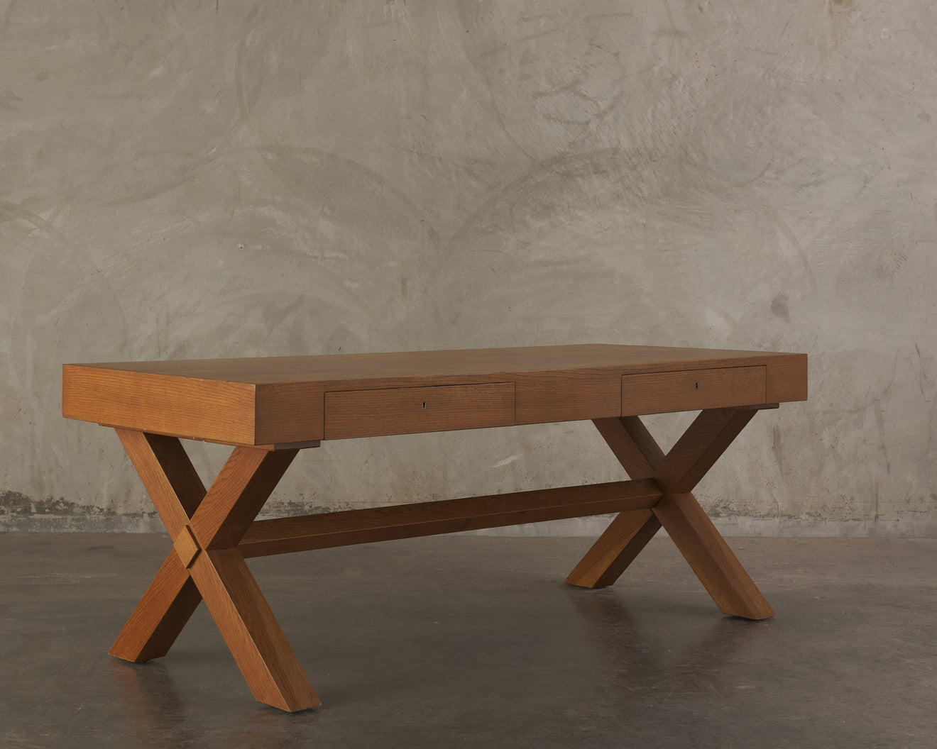 TWO DRAWER OAK DESK IN THE MANNER OF ROBSJOHN GIBBINGS