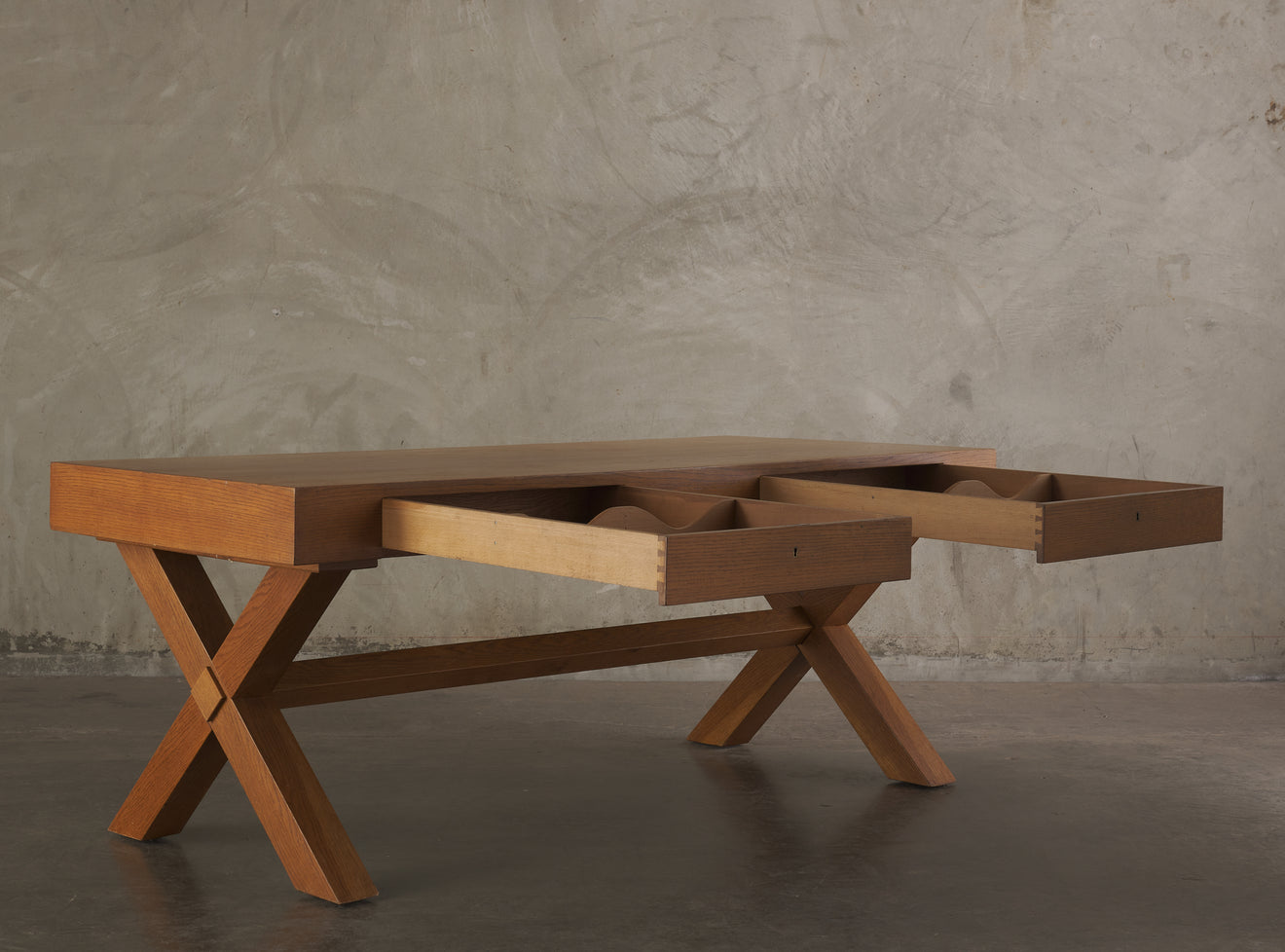 TWO DRAWER OAK DESK IN THE MANNER OF ROBSJOHN GIBBINGS