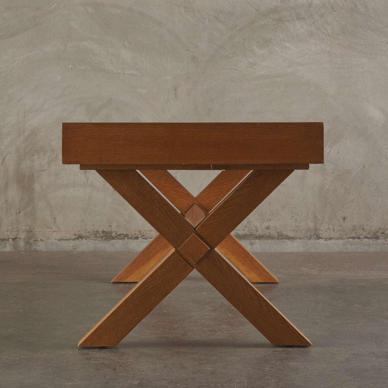 TWO DRAWER OAK DESK IN THE MANNER OF ROBSJOHN GIBBINGS