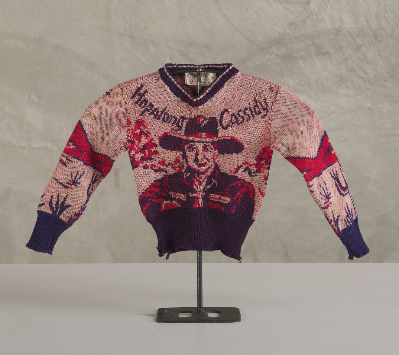 VINTAGE HOPALONG CASSIDY CHILD'S SWEATER ON STAND, 1940's