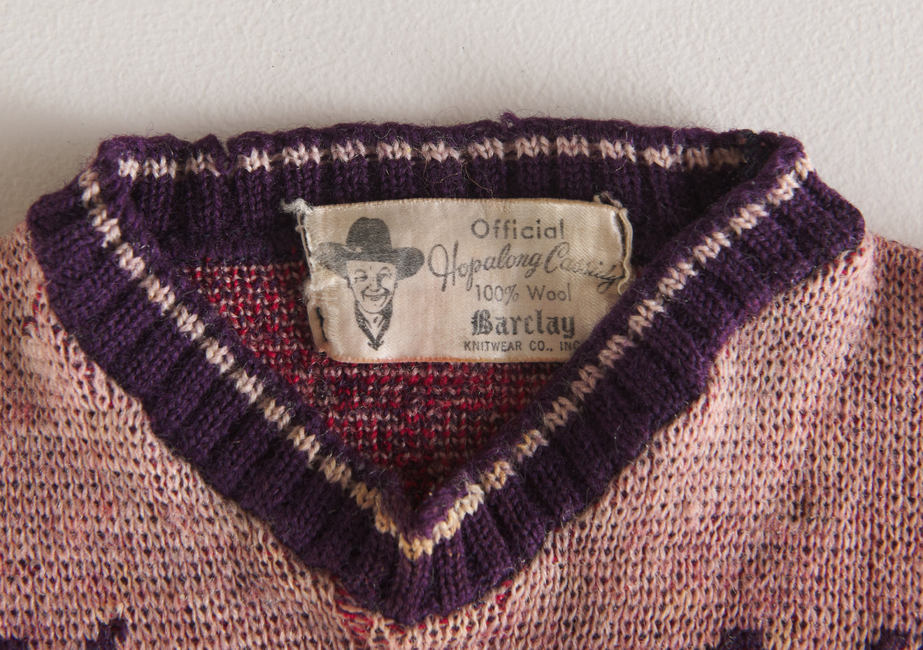VINTAGE HOPALONG CASSIDY CHILD'S SWEATER ON STAND, 1940's