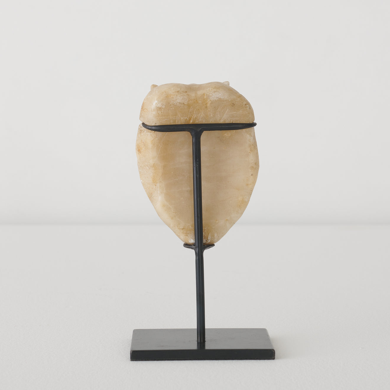 ALABASTER GROTESQUE HEAD STAND