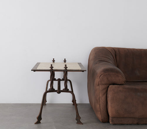 FRENCH IRON AND TRAVERTINE SIDE TABLE