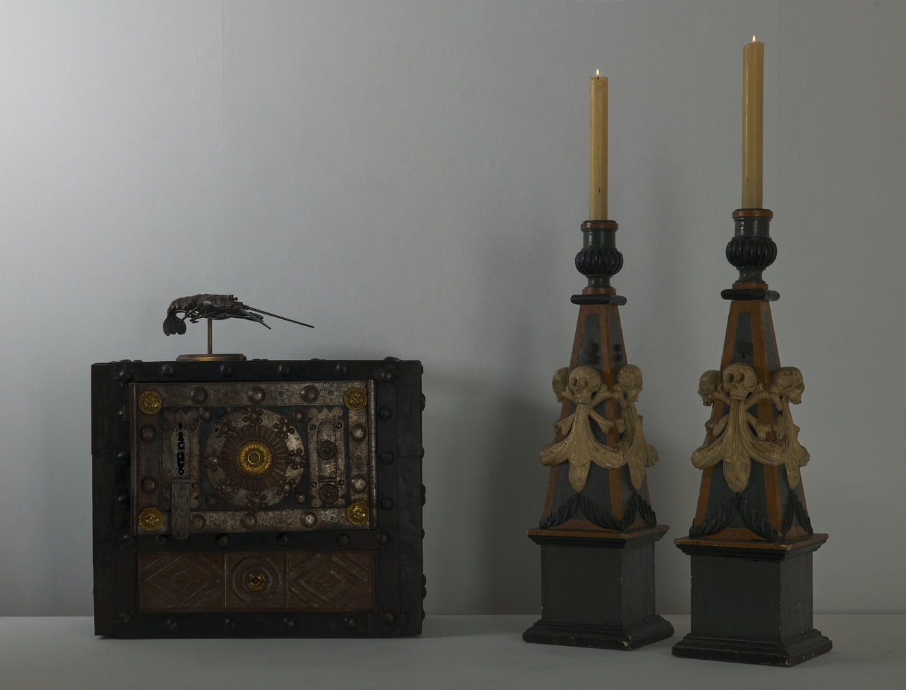 PAIR OF ITALIAN 17TH C MEMENTO MORI CANDLESTICKS